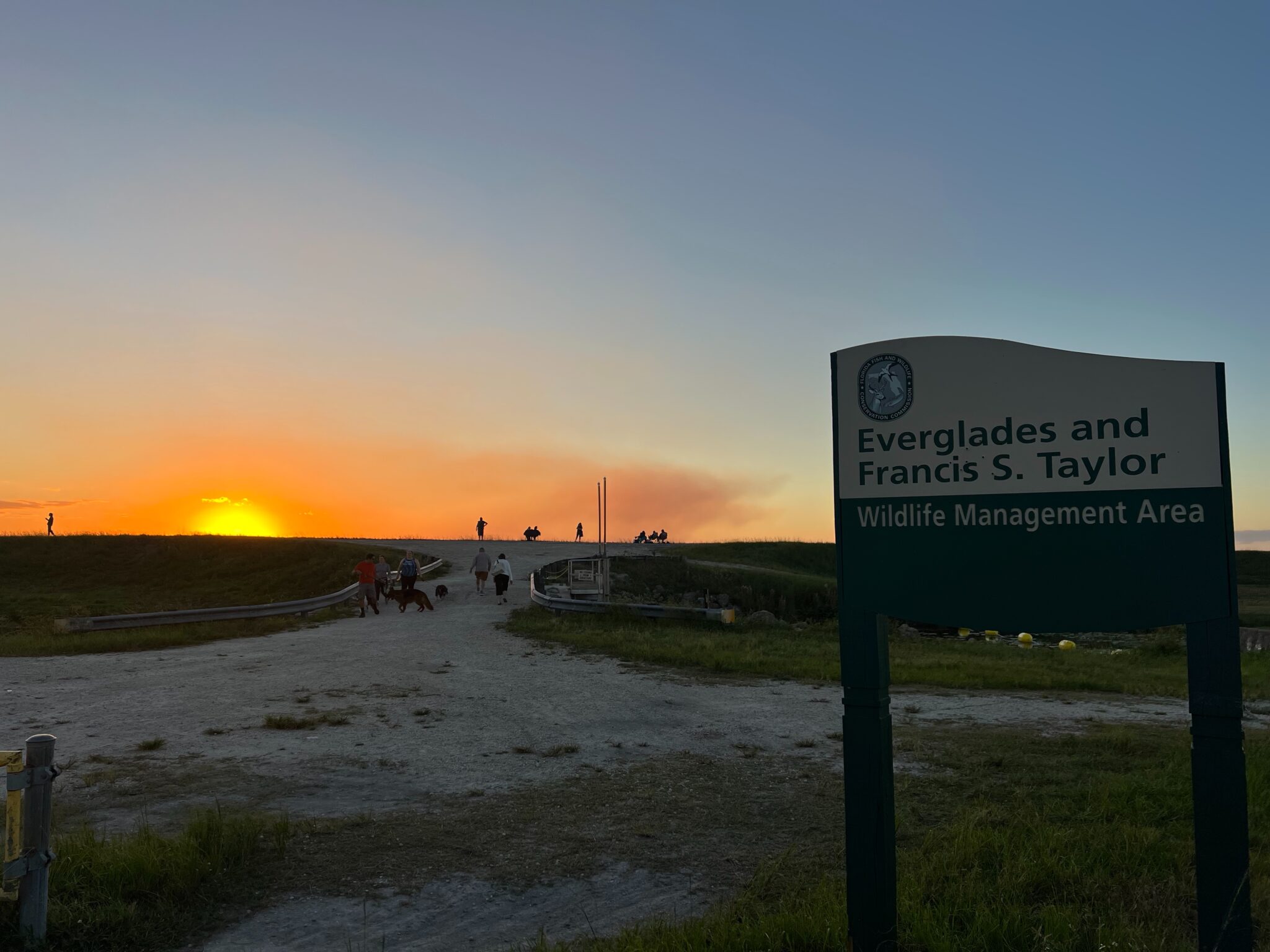 Everglades trailhead sign at sunset
